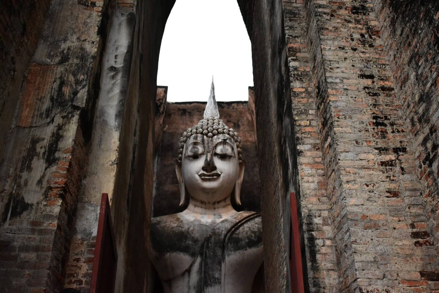 Phra Achana Buddha image in Wat si Chum temple, North zone of the Sukhothai Historical Park, another of the musts in your things to do in Sukhothai
