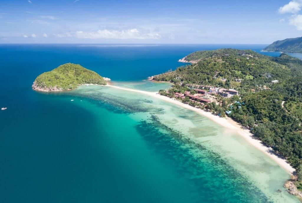 A stunning aerial view of Bottle Beach, on the west coast of Koh Phangan